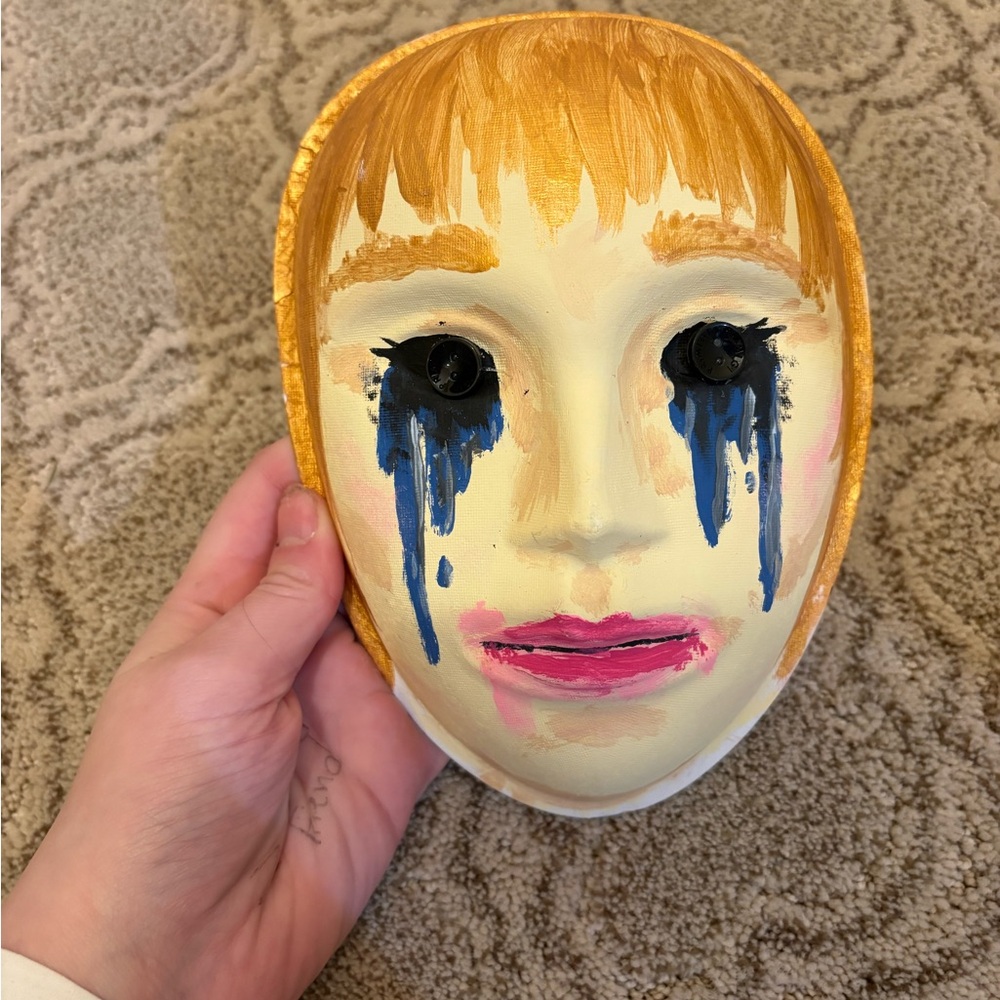 Artistic Painted Mask with Gold and Pink Accents